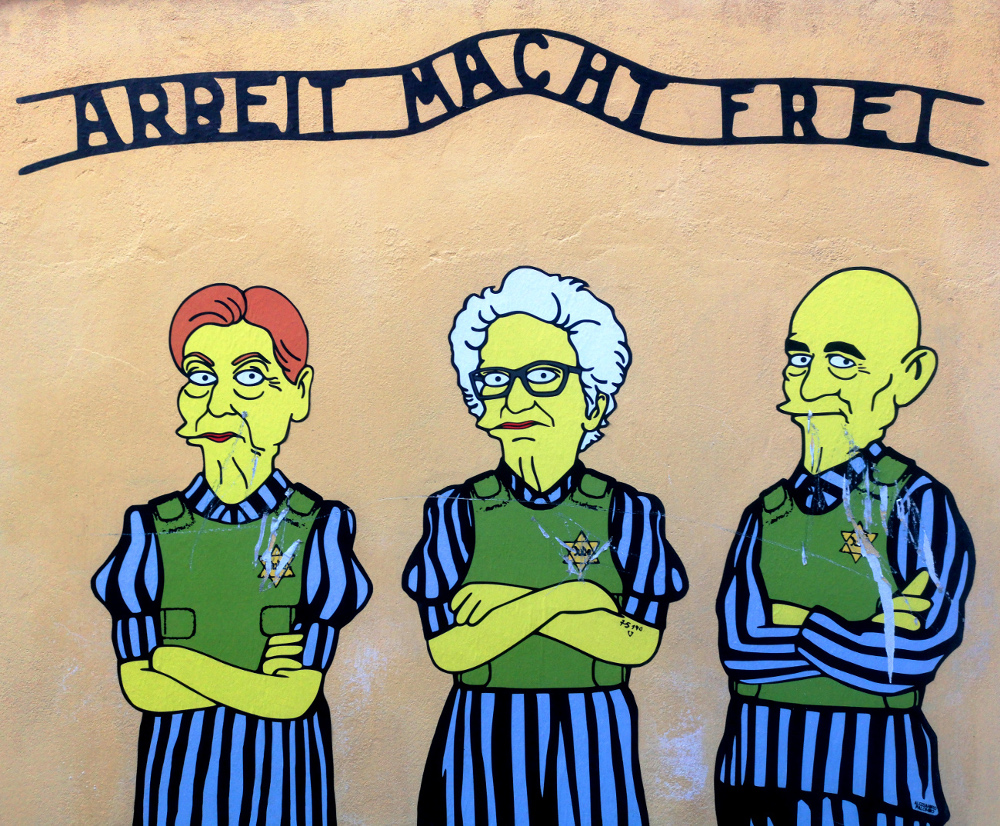milan mural of segre bruck and modiano vandalised with swastika