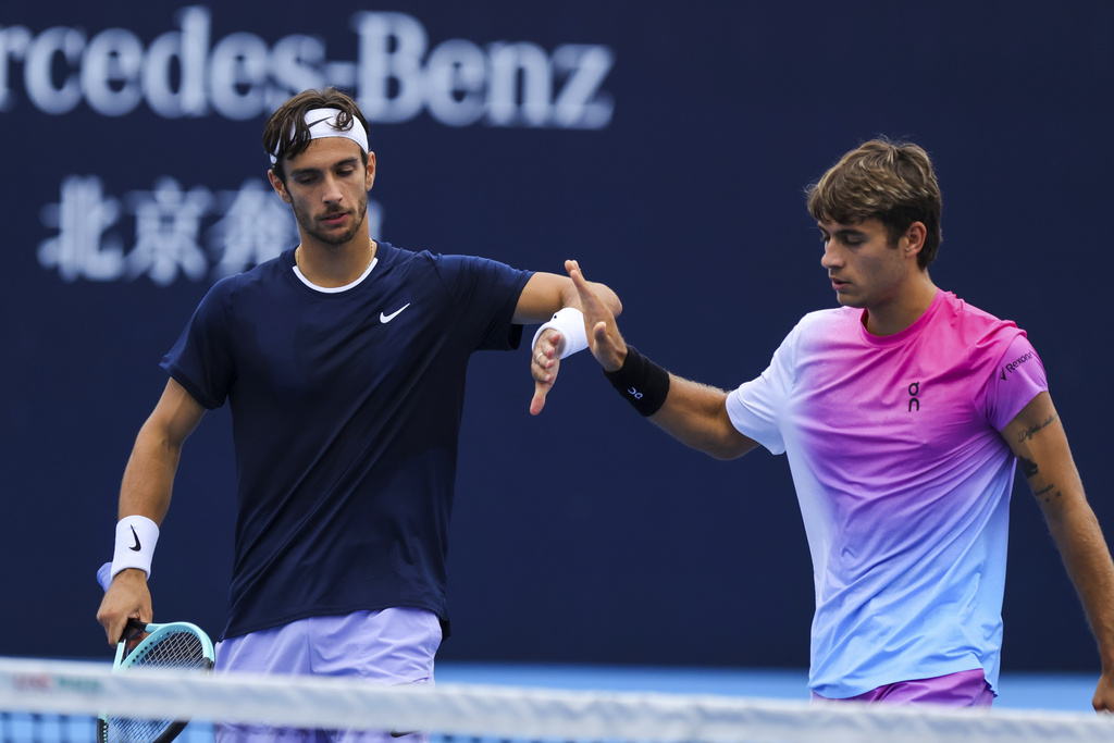 atp madrid musetti and cobolli advance in doubles