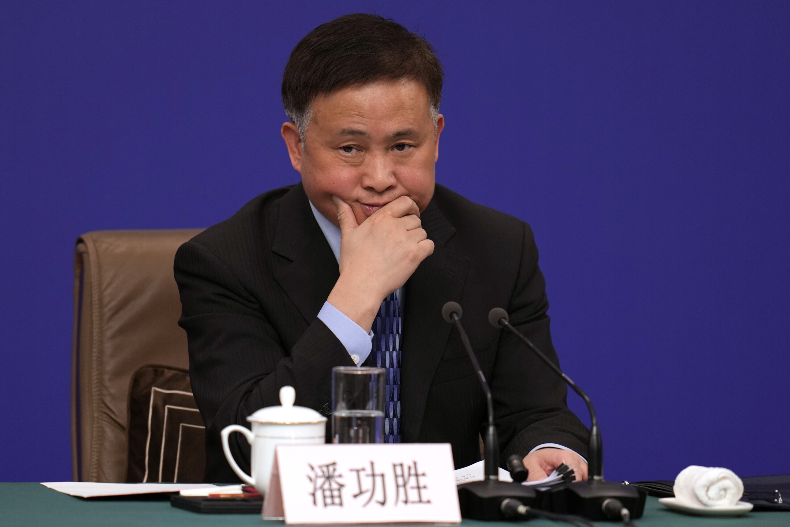 beijing cuts interest rates and bank reserve requirements scaled