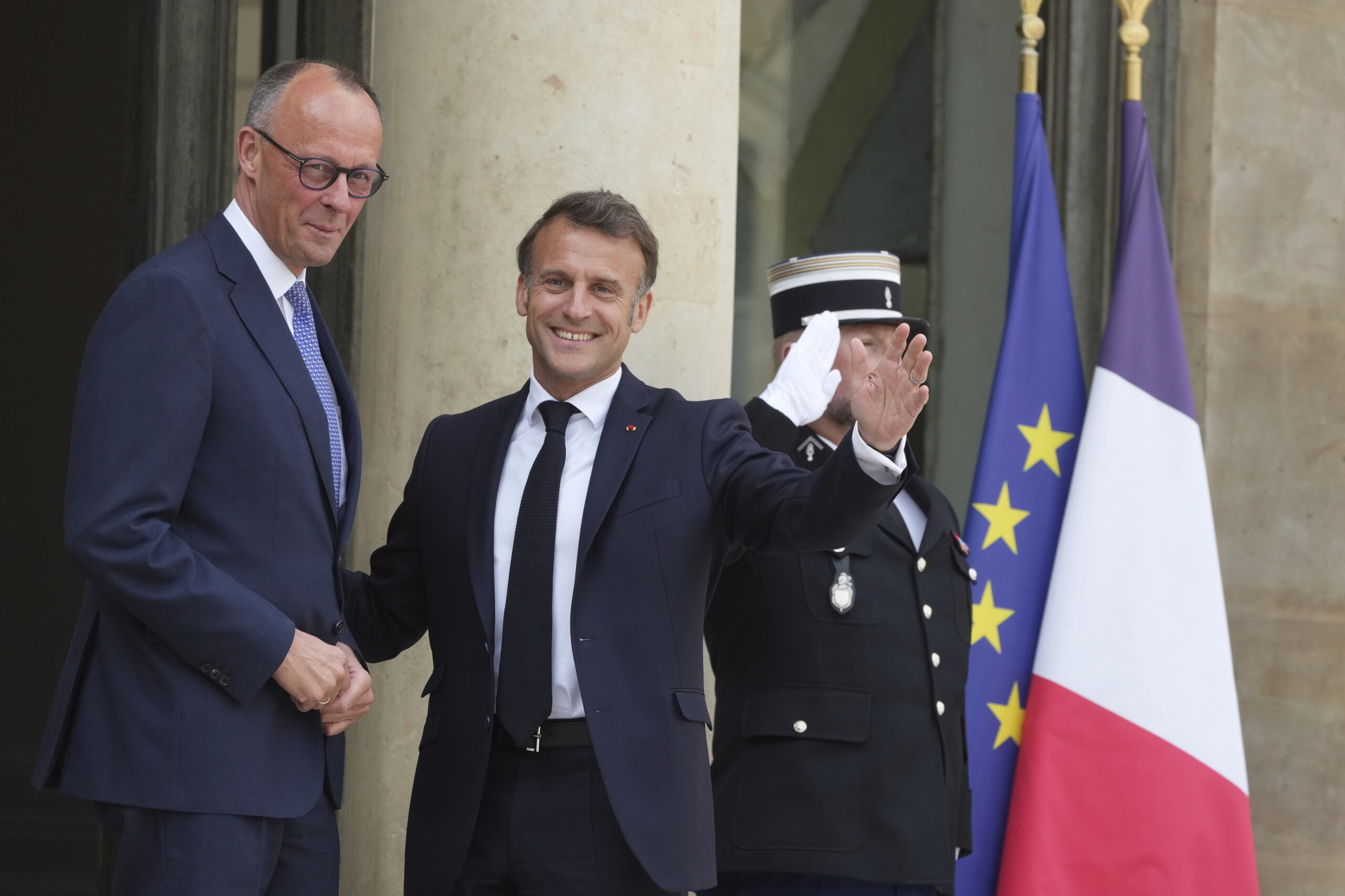 macron meets merz we will respond together to europes challenges scaled