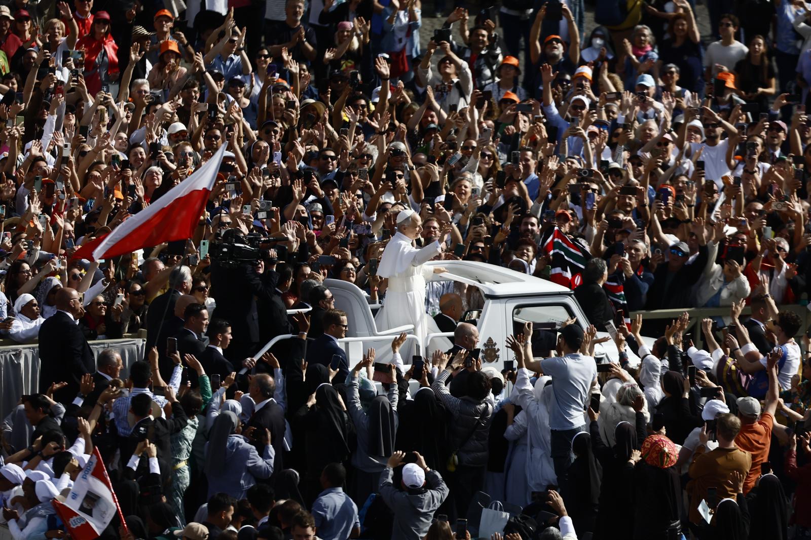 vatican first ride in the popemobile among the faithful for pope leo