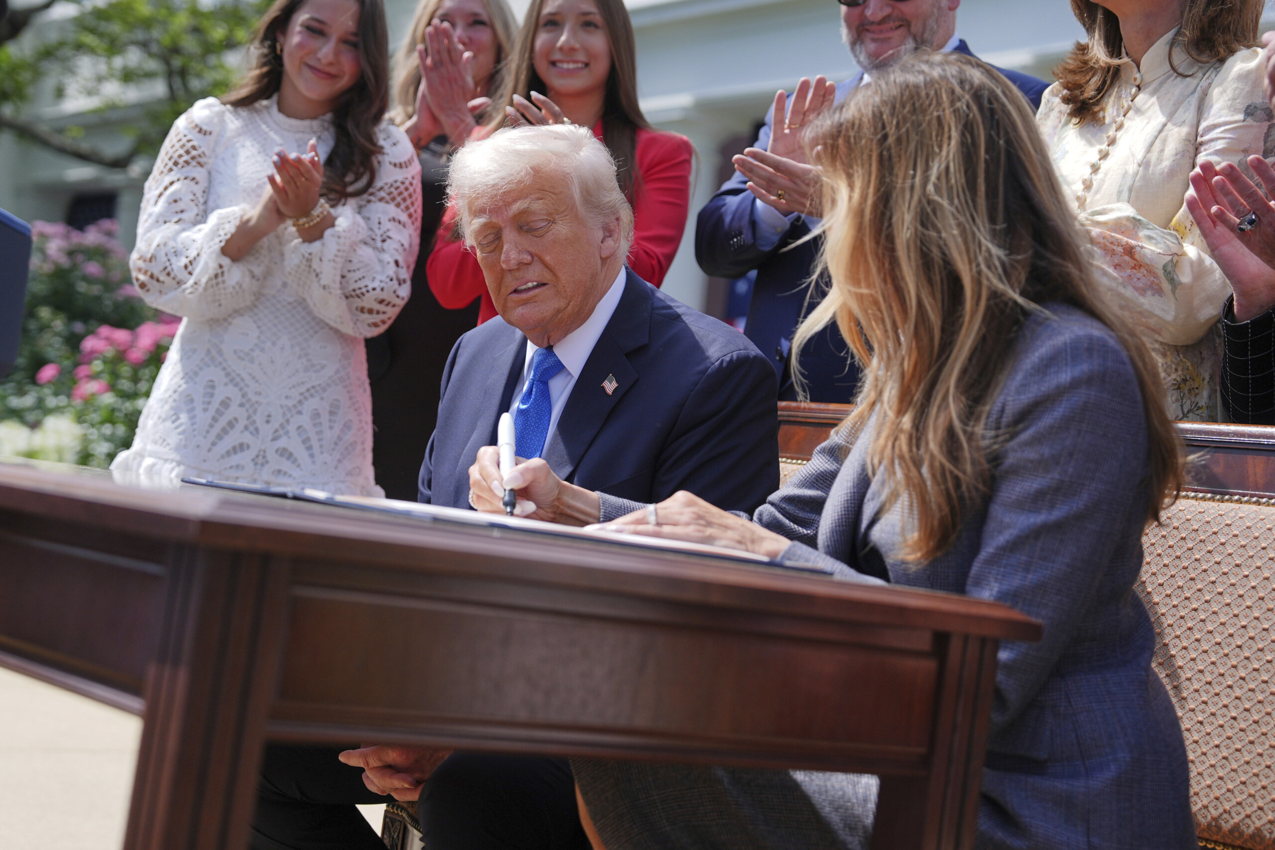 usa trump signs with melania the law against revenge porn scaled