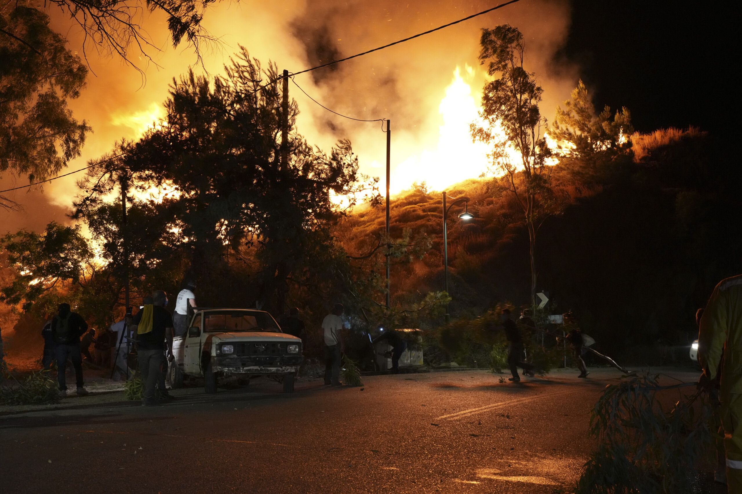 greece fire in pine forest near corinth villages evacuated scaled