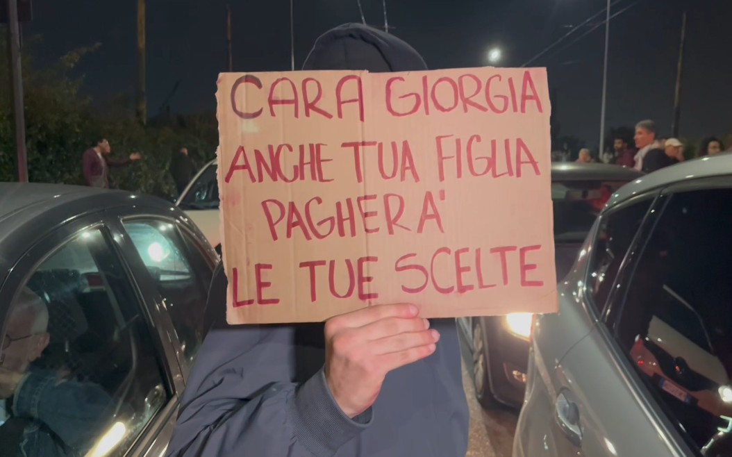 gaza your daughter will pay too signs against meloni at pro palestinian march in milan