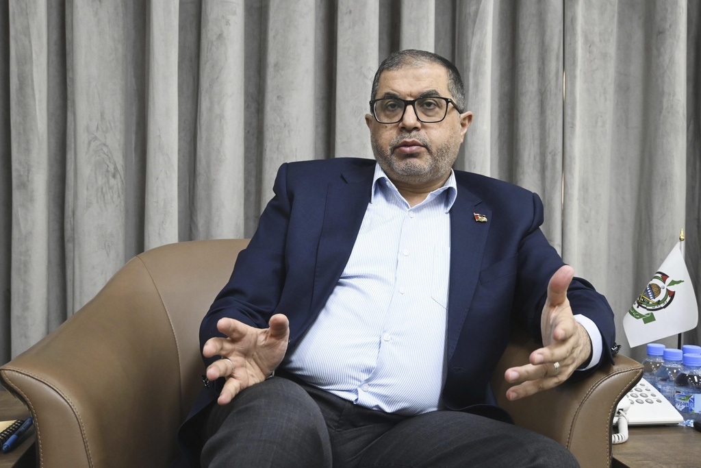 gaza hamas no to complete disarmament and opposed to blairs role