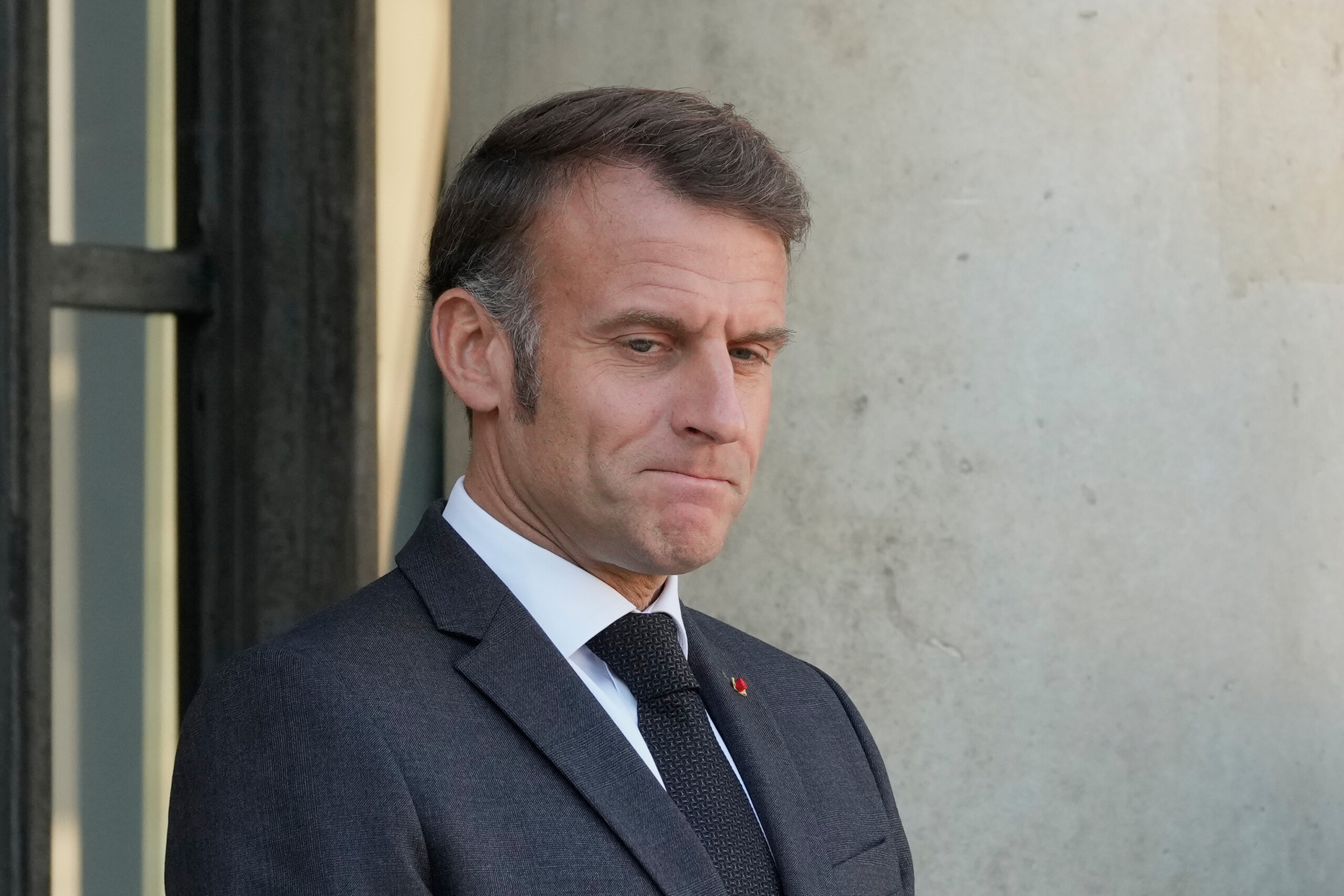 macron the louvre theft is an attack on our history we will find those responsible scaled