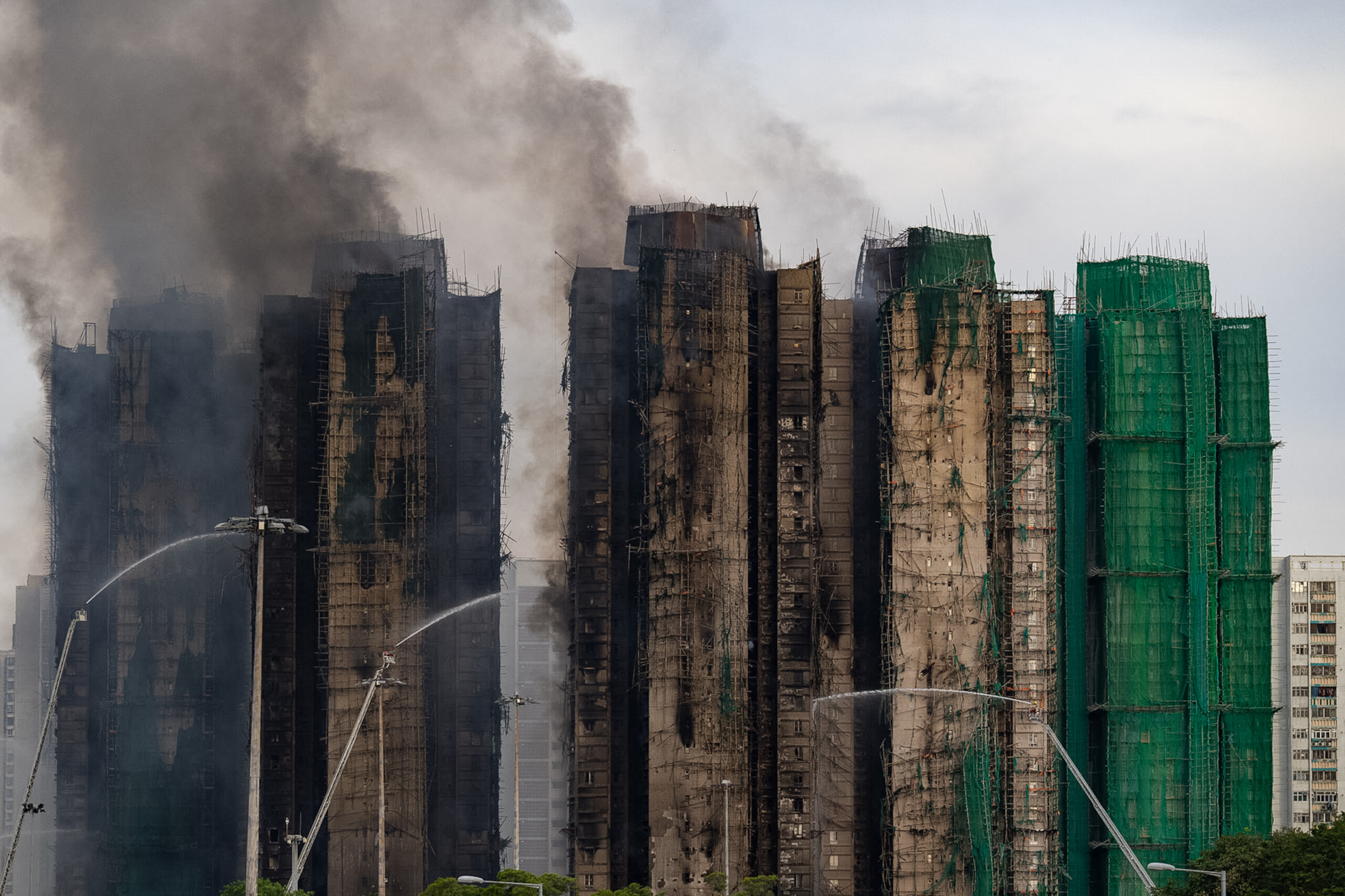 hong kong fire in seven skyscrapers death toll rises to 75 scaled