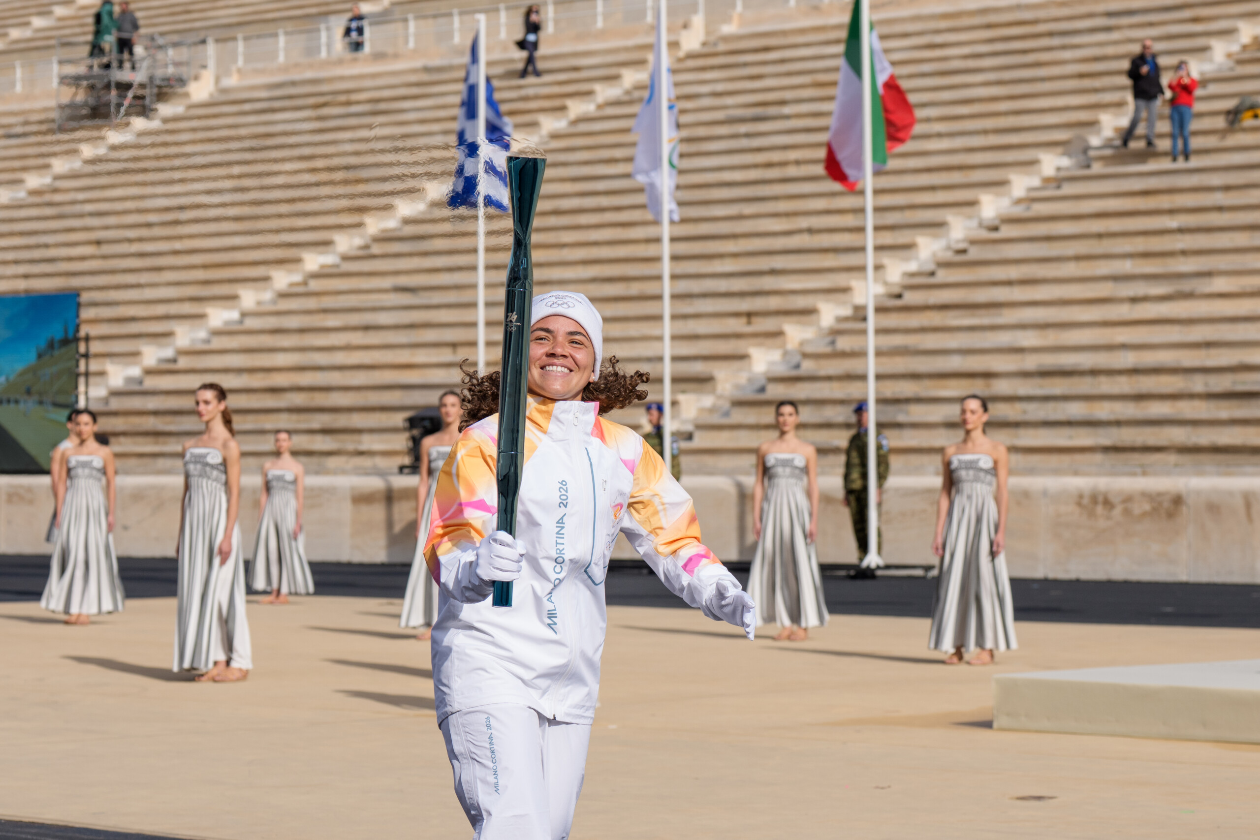 milan cortina olympic flame arrives in italy scaled