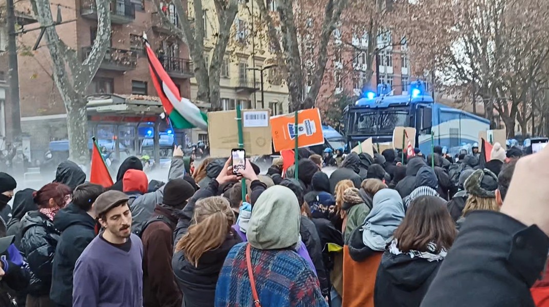 turin clashes at askatasuna march water cannons and tear gas used dumpsters set on fire