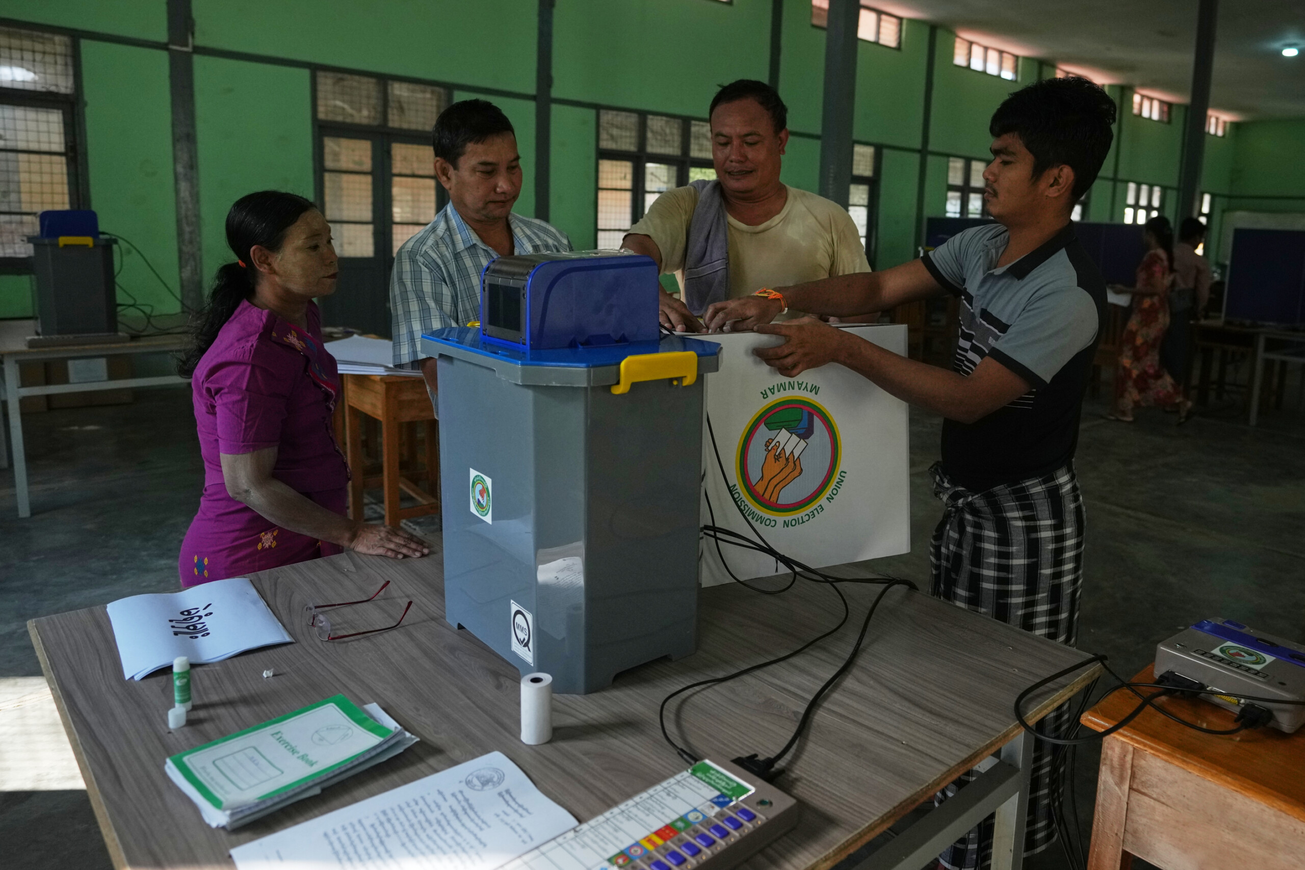 myanmar polls open for first elections since military takeover scaled
