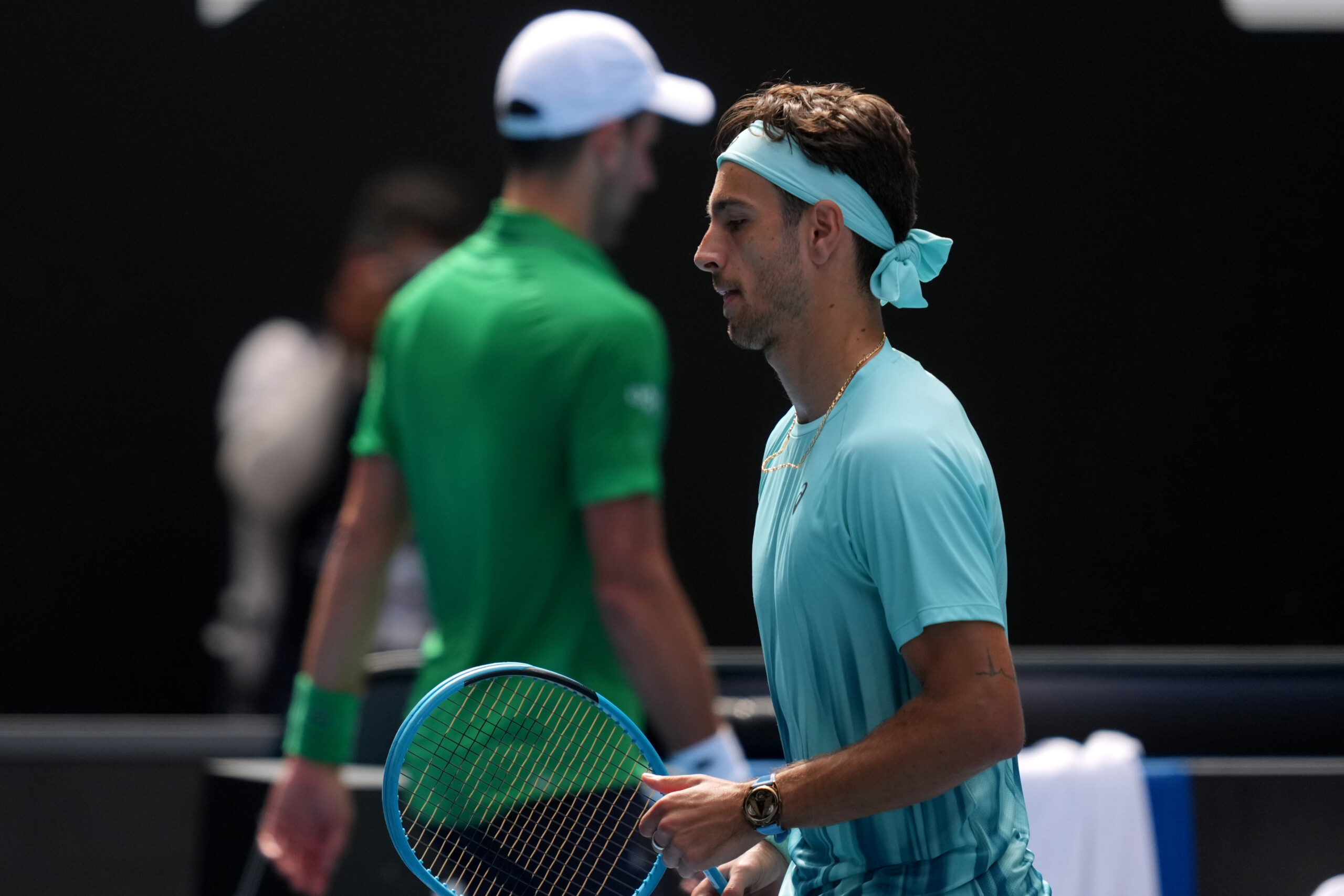 australian open musetti retires two sets up djokovic reaches semi finals scaled