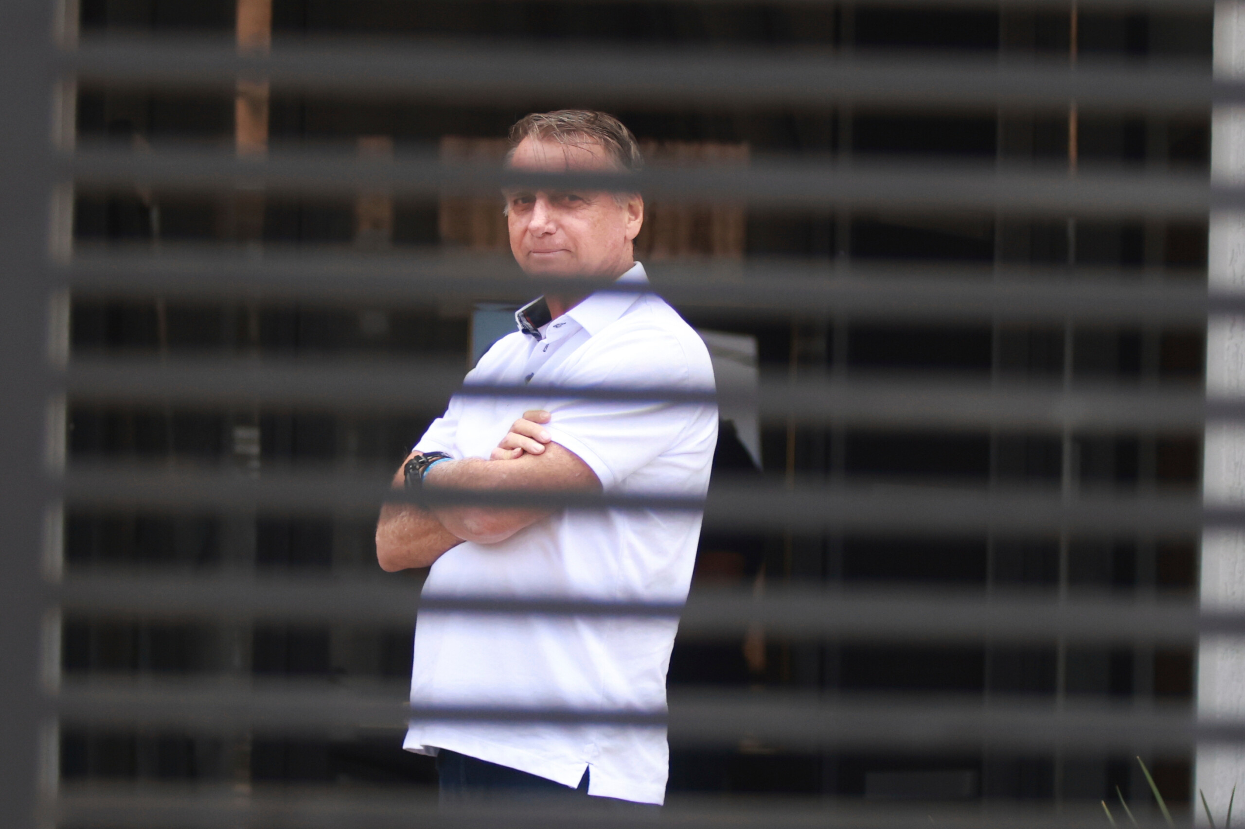 brazil bolsonaro discharged from hospital remains under house arrest scaled