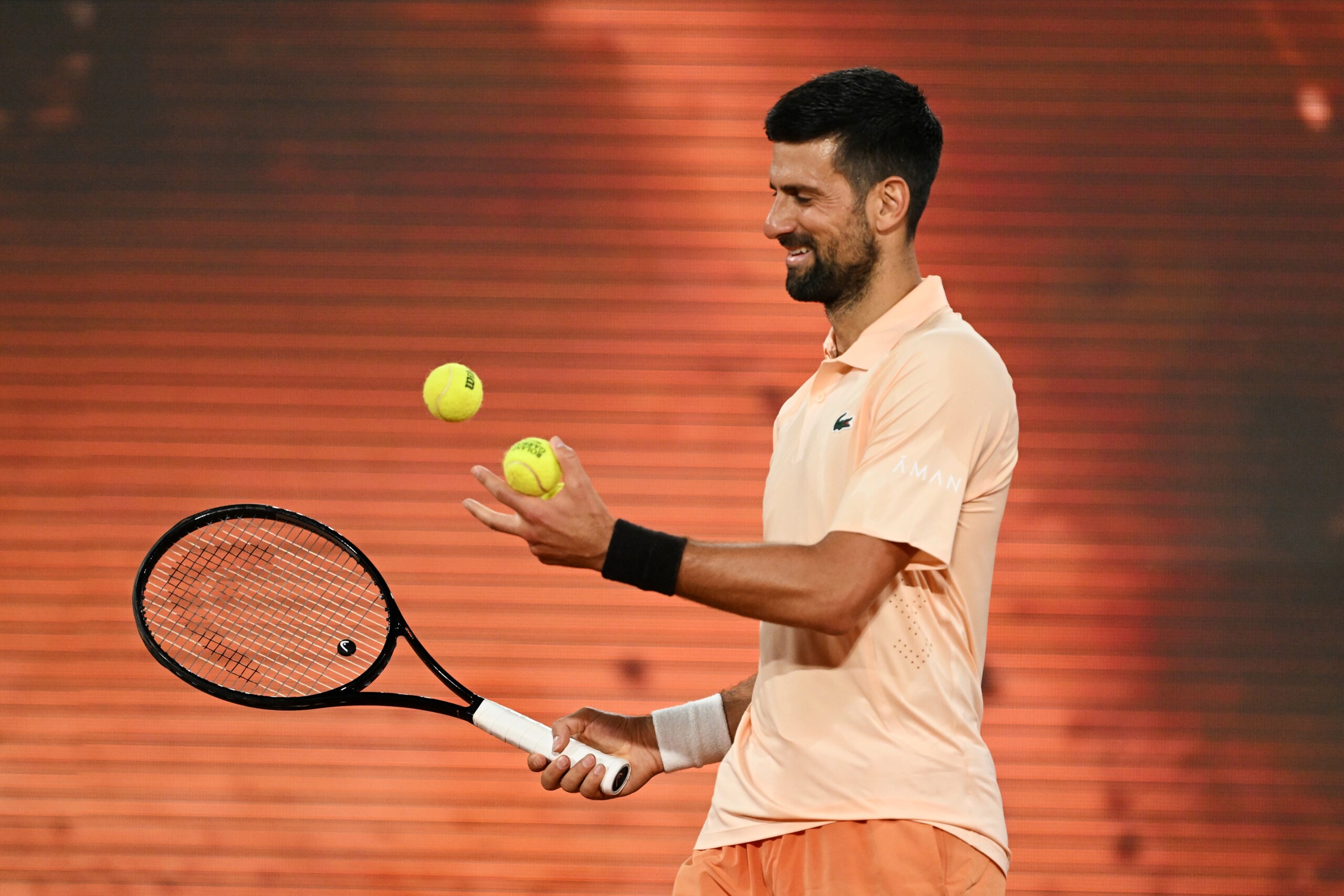 roland garros djokovic struggles but reaches the second round fritz is out in the first round scaled